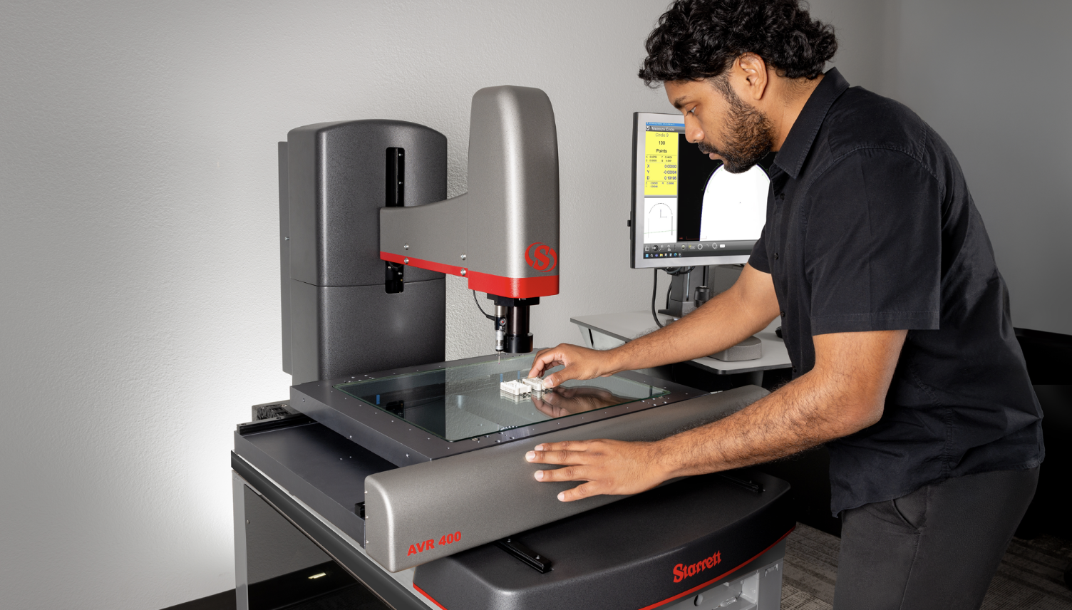 Starrett AVR400 Multisensor Vision System featuring a touch probe utilized for quick acquisition ofdiscreet points along a part’s profile as well as Z-axis measurements.   